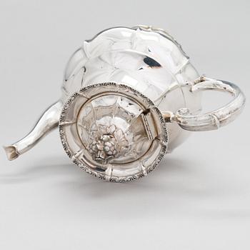 A silver coffee pot, a parcel-gilt sugar bowl and cream jug, Turku Finland 1946 and 1985.