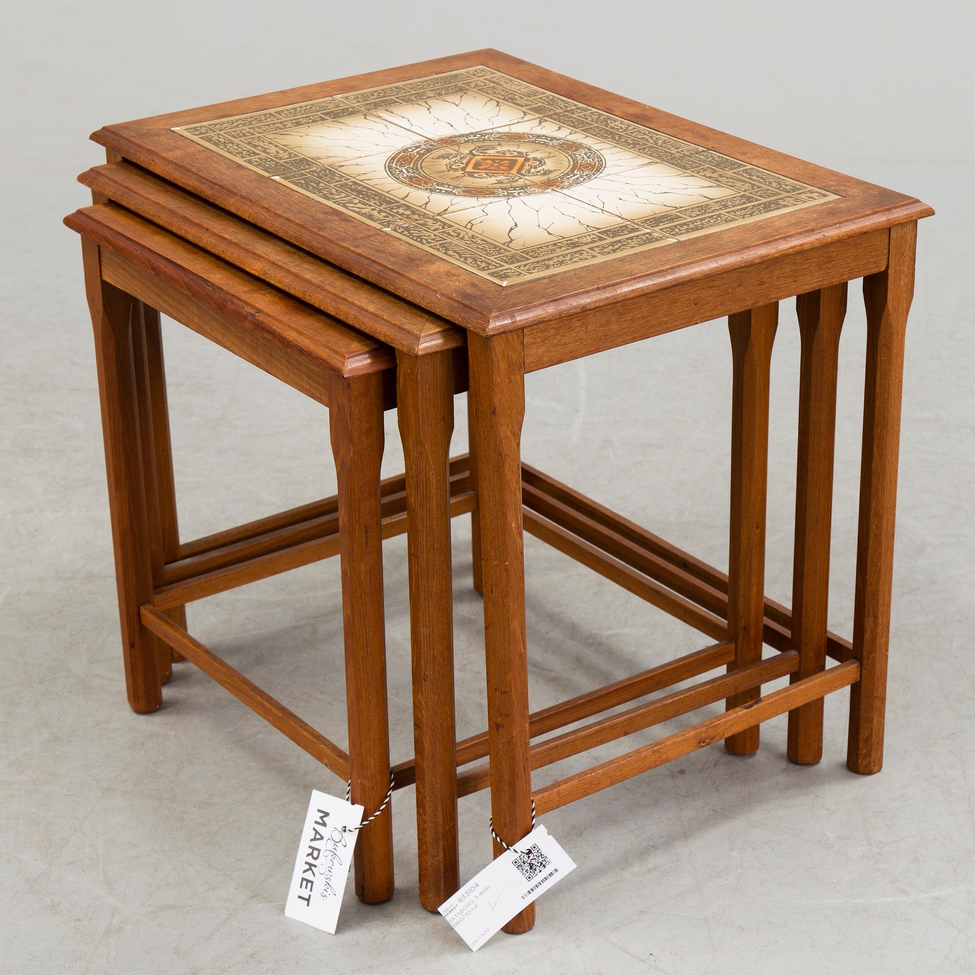 A nest of three 1960/70s tables.