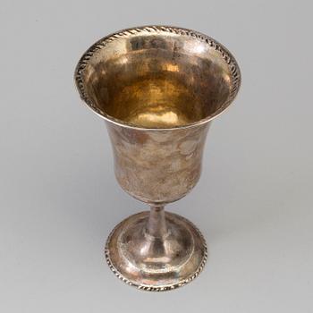 A silver cup dated 1923.