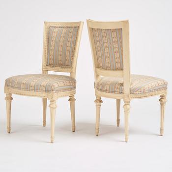 A set of nine Gustavian chairs by A Hellman (master in Stockholm 1761-94) and E Ståhl (master in Stockholm 1794-1820).