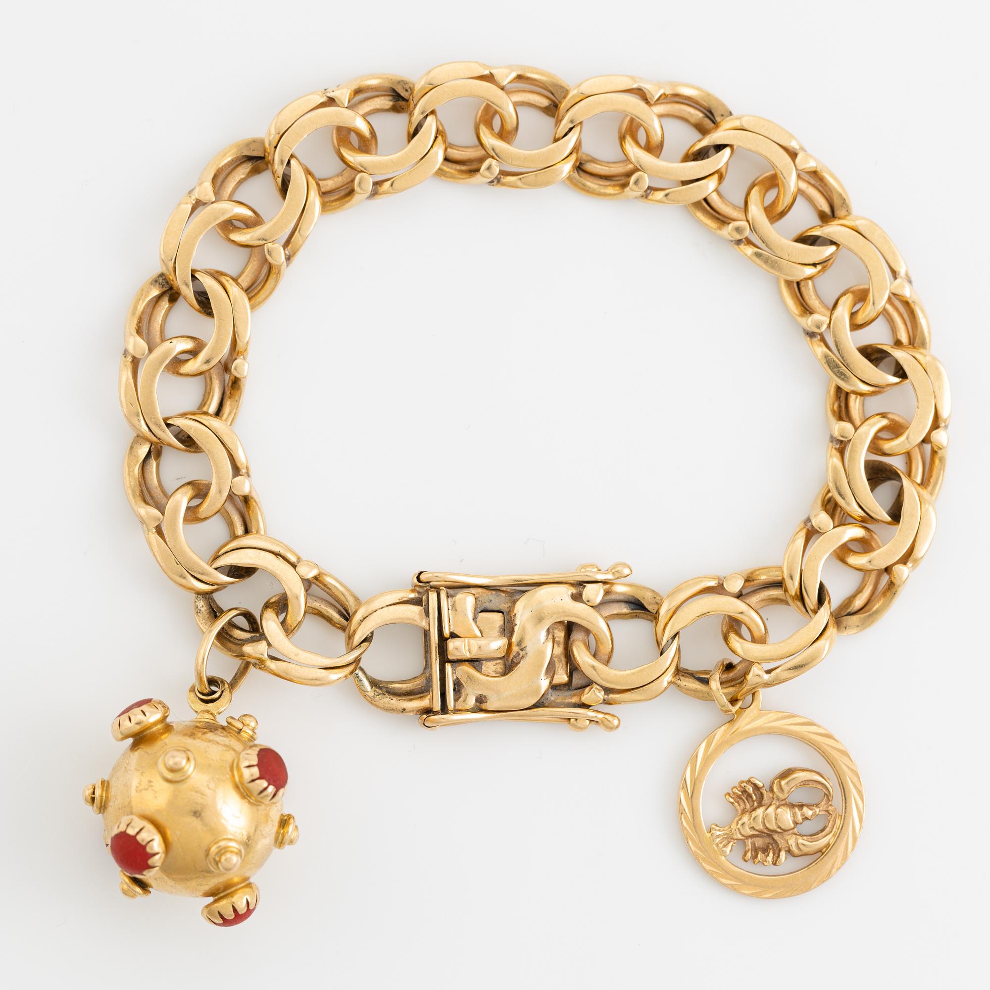 Gold charm bracelet.