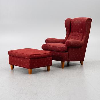 Carl Malmsten, a 'Häggbom' armchair with a 'Jättepaddan' ottoman, AB OH Sjögren, Tranås.