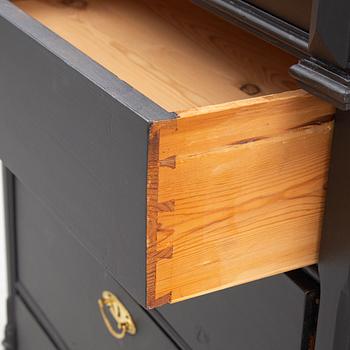 A chest of drawers, circa 1900.