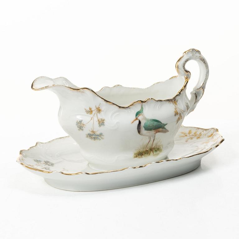 A 15 piece ‘birds’ porcelain dinner service, around 1900.