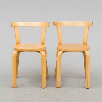 Nine model 68 chairs by Alvar Aalto, designed in 1935.