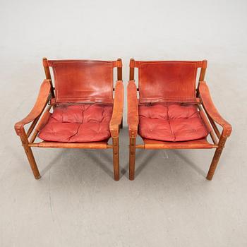 Arne Norell armchairs, a pair of "Sirocco", later part of the 20th century.