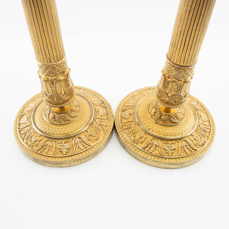 A pair of candlesticks, Empire France first half of the 19th century.