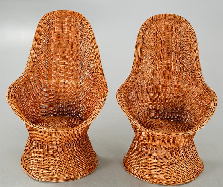 A pair of chairs and one table from the latter half of the 20th century.