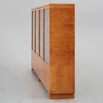 Carl Malmsten, a walnut bookcase, Sweden, 1930s.