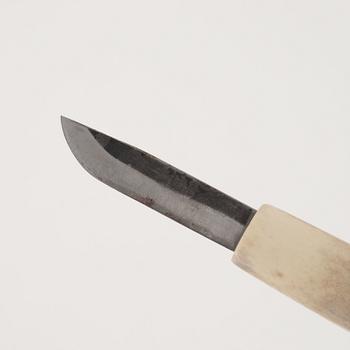 Jon Tomas Utsi, a reindeer horn knife, signed.