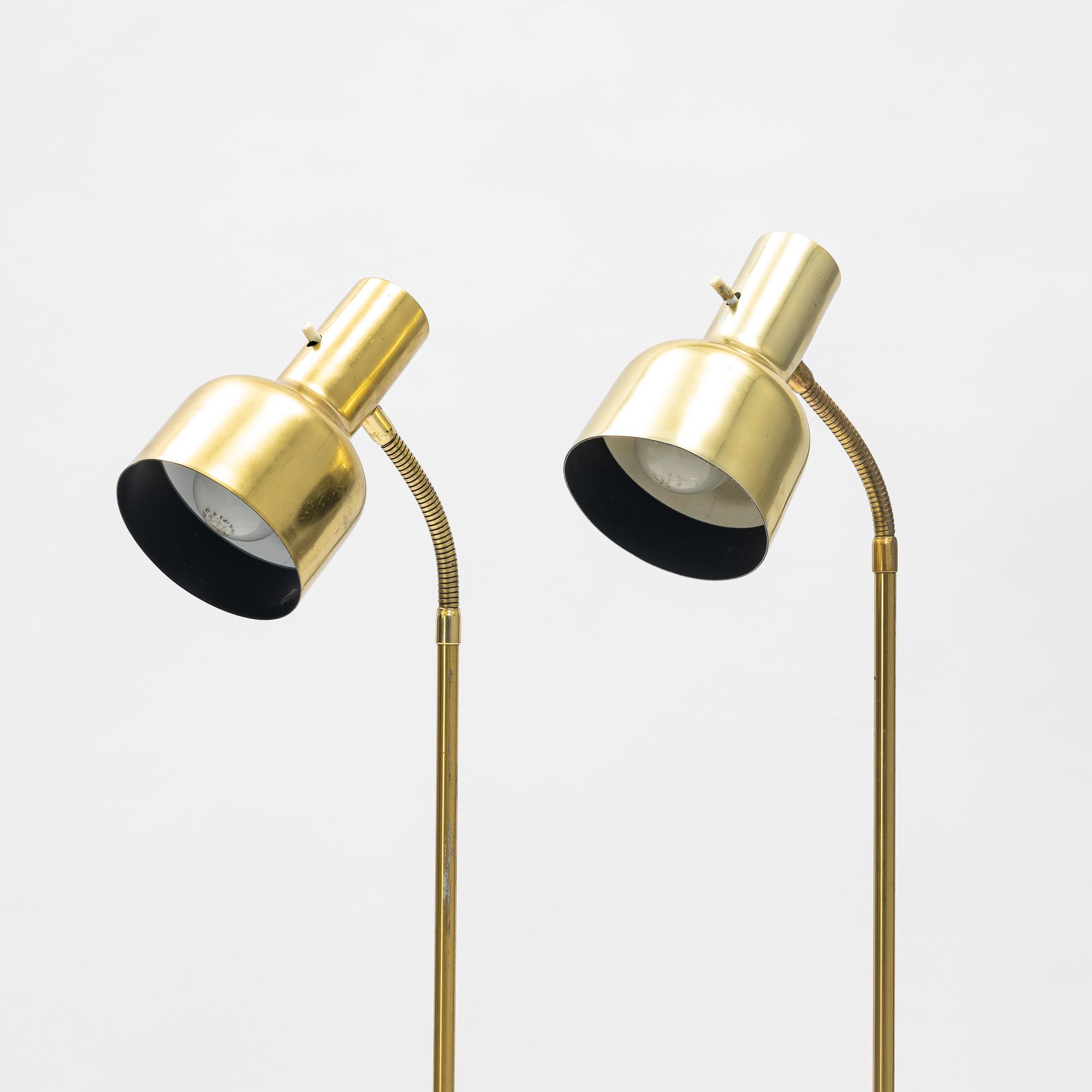 A pair of brass floor light from Möller Armatur, second part of the 20th Century.