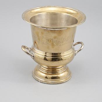 CHAMPAGNEKYLARE, vitmetall, omkring 1900-talets mitt.