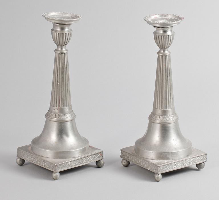 A pair of pewter candlesticks, makers mark by Nils Justelius, Eksjö, 1840.