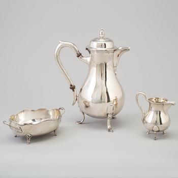 A three-piece silver coffee service from Borel & Co, Germany, mid 20th Century.