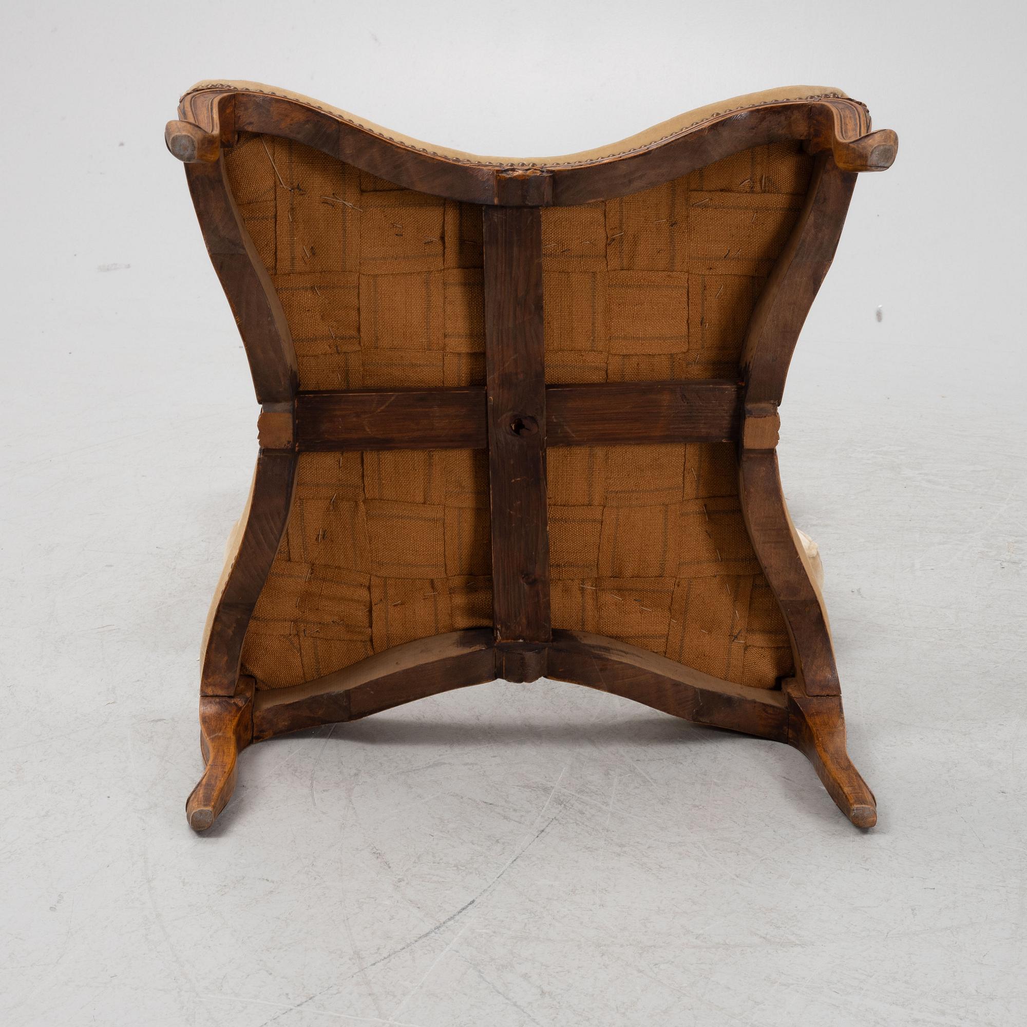 A Rococo style ottoman, around 1900.