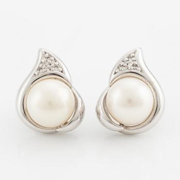 Earrings, 18K white gold with cultured pearls and small diamonds.