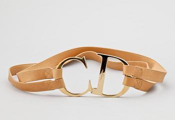 1422. A beige leather belt by Christian Dior.