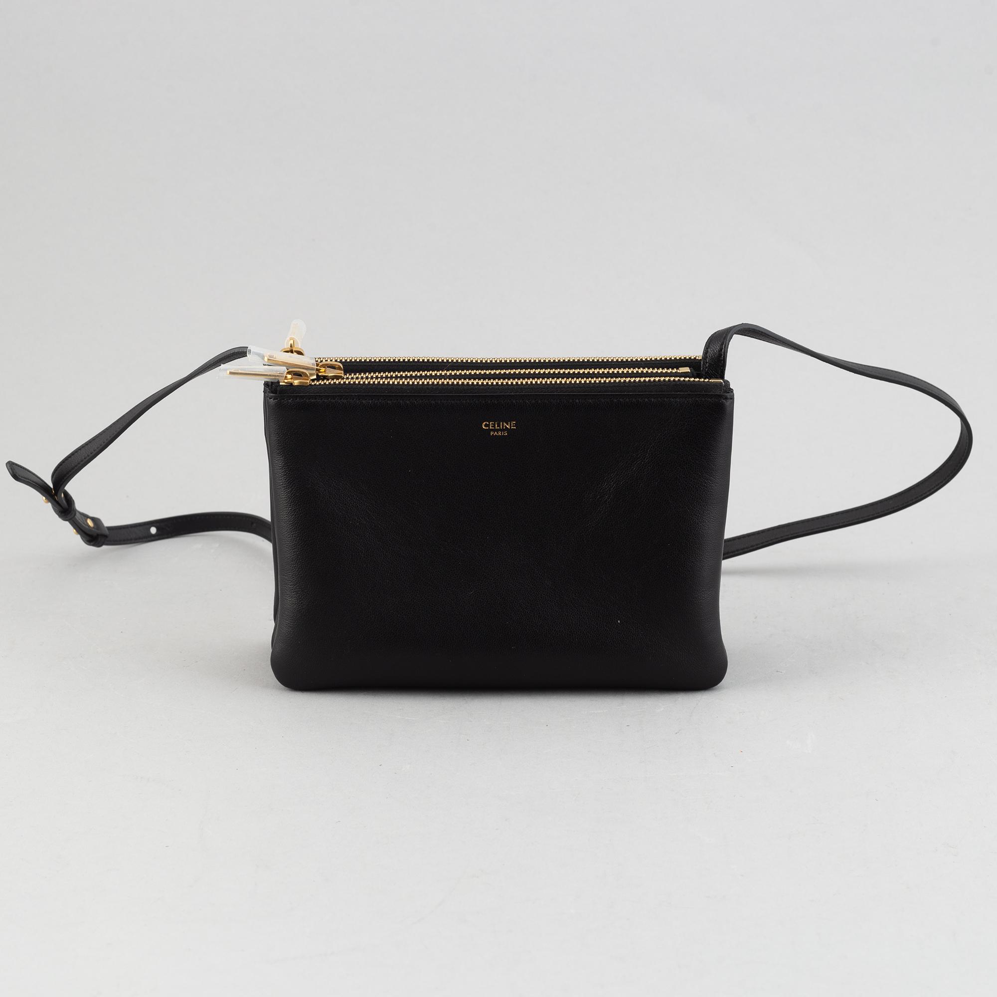 Céline, a black leather 'Trio Bag'.