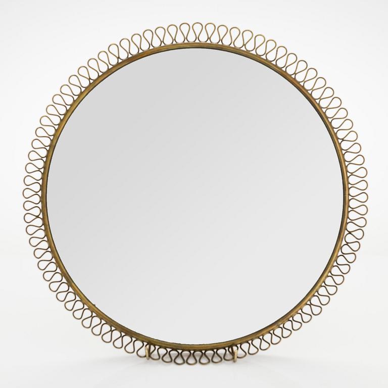 A mid-20th-century Swedish Modern mirror.