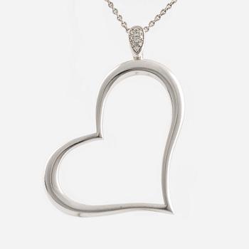 Piaget, 18K white gold and brilliant cut diamond heart necklace.