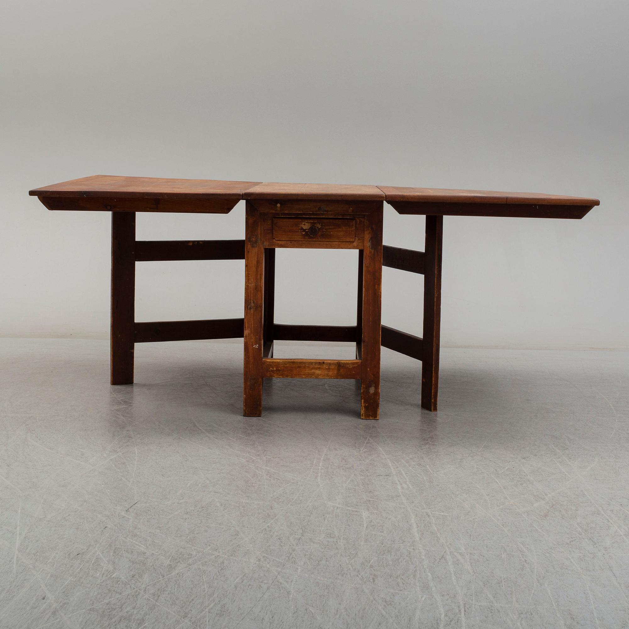 A GATELEG TABLE, 19th century.