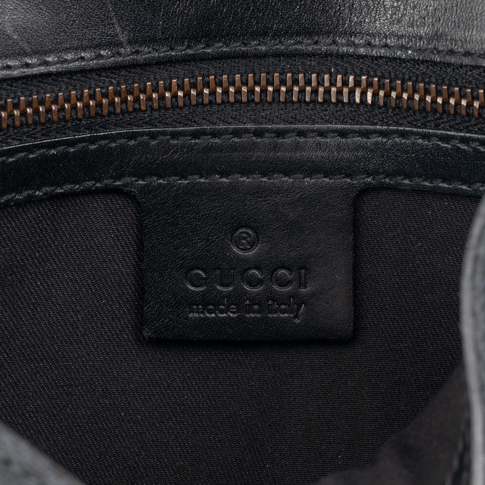 Gucci, väska och plånbok.