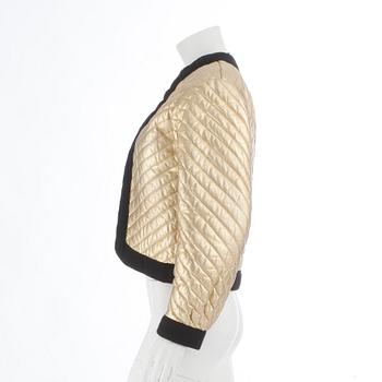YVES SAINT LAURENT, a gold colored leather jacket.Size 34.