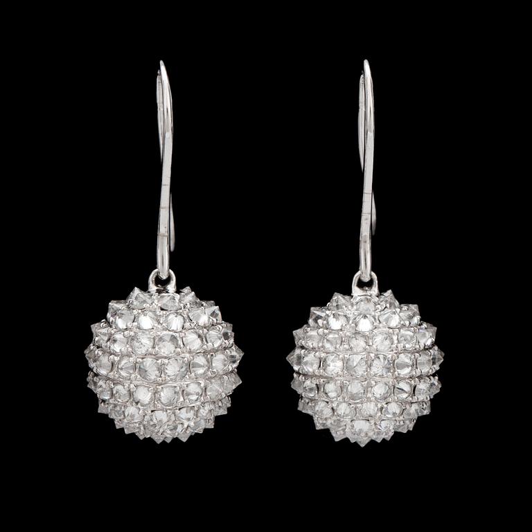 A pair of diamond, circa 4.87 cts in total, earrings.