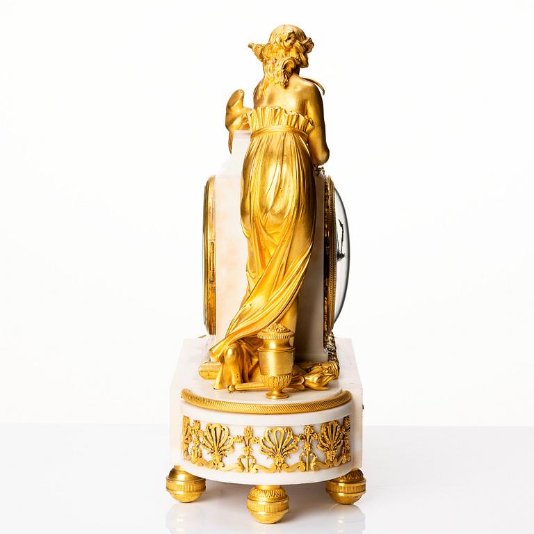 A Louis XVI marble and ormolu mantel clock, late 18th century.