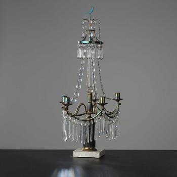 A late Gustavian early 19th century four-light candelabra.