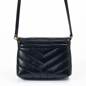 Yves Saint Laurent, a sholder bag.