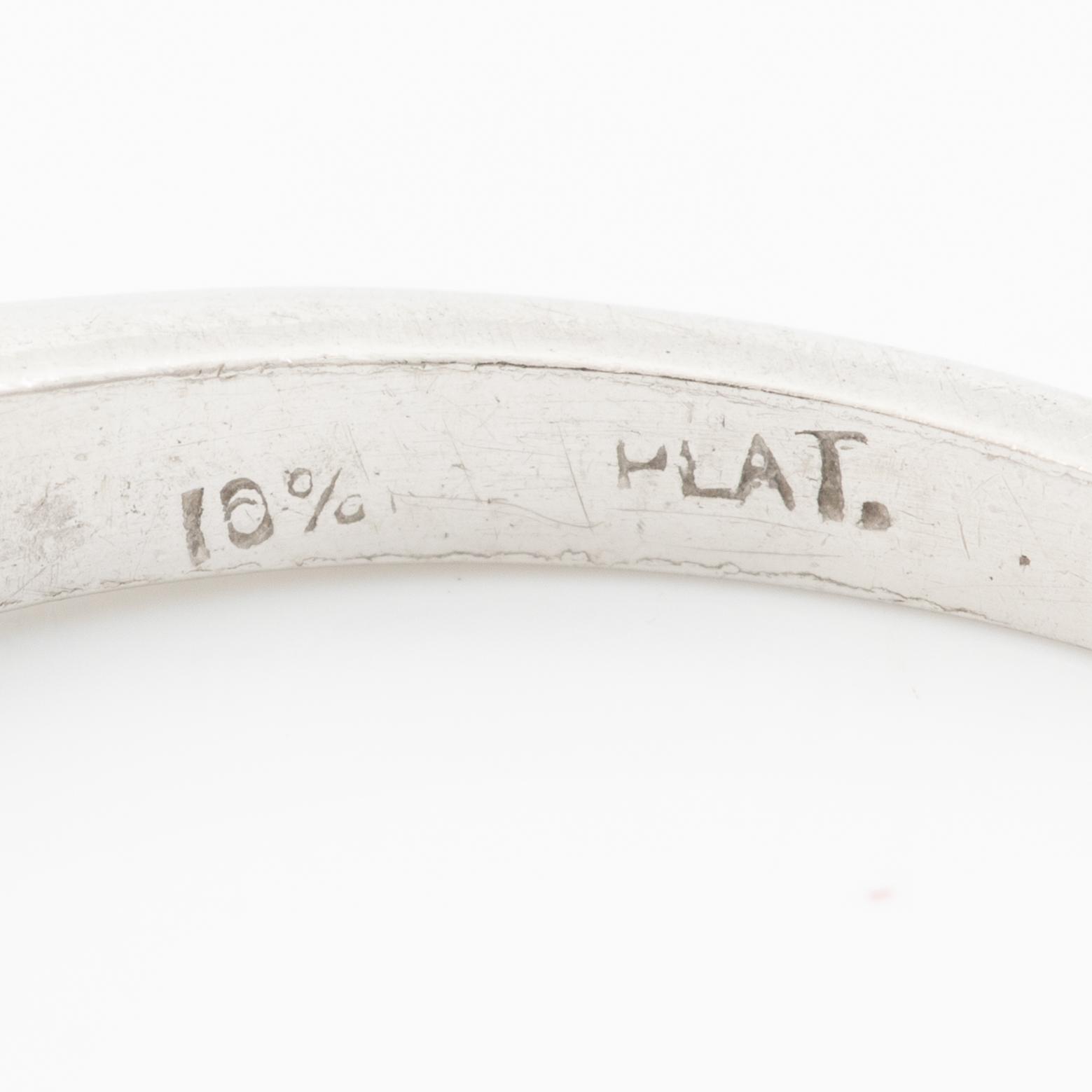Platinum ring with baguette-cut diamonds.