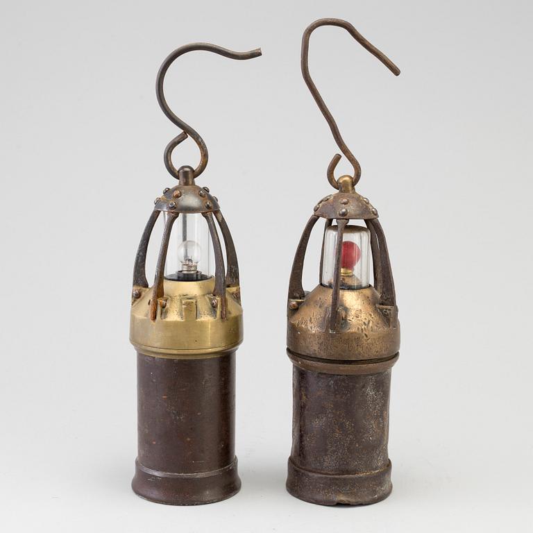 TWO 19TH CENTURY IRON AND BRONZE MINE LANTERNS.