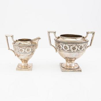 A 2 pcs silver sugar-bowl and creamer mark of A Nilsson Lund 1917, weight 460 grams.