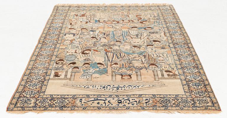 A Persian Kerman Laver 'Mashahir' (The rulers of the world) rug, c. 230 x 143 cm.