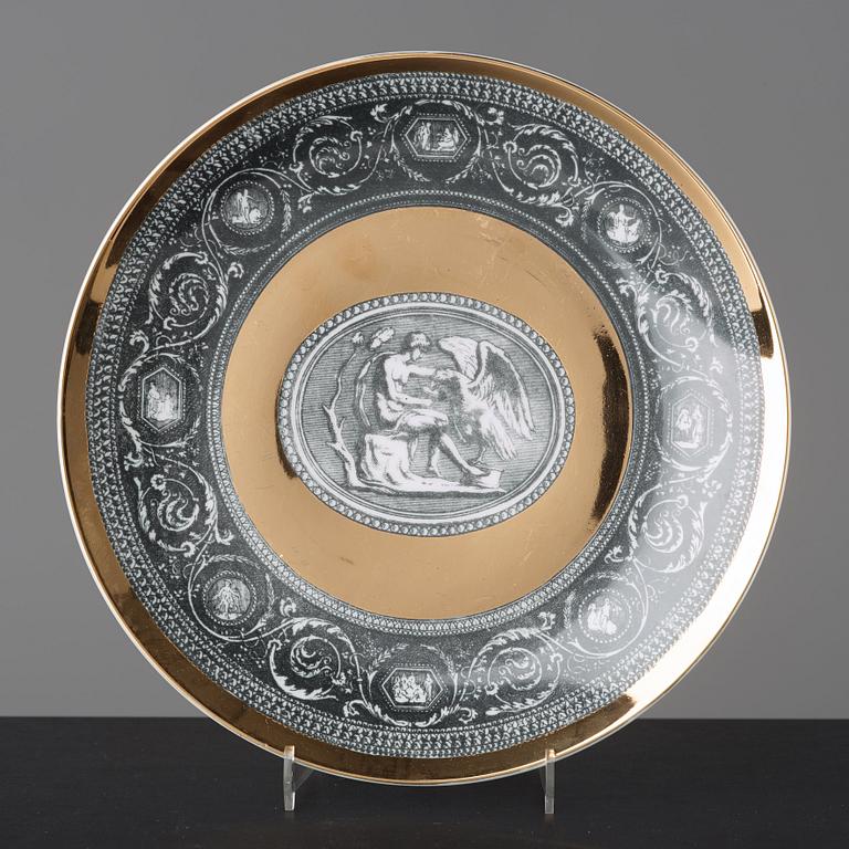 Piero Fornasetti, a set of six "Cammei" porcelain plates, Milano, Italy.