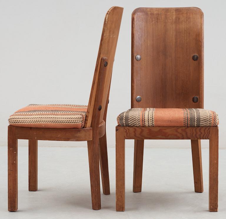 A set of four Axel Einar Hjorth 'Lovö' stained pine chairs, Nordiska Kompaniet.