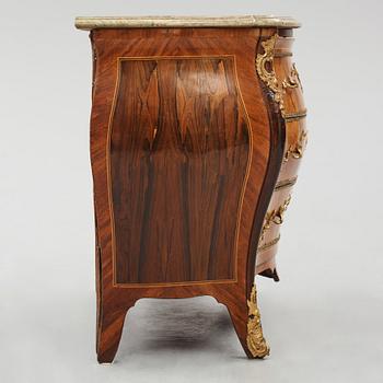 A rococo ormolu-mounted and parquetry commode attributed to C. G. Willkom (master in Stockholm 1763-65).