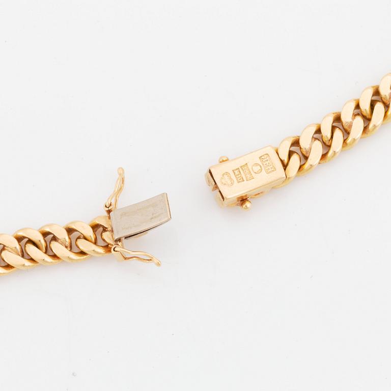 An 18K gold necklace with a round brilliant-cut diamond weight ca 1.65 cts quality ca I vs, by Jan Hellströmer.