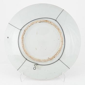 A Kanton porcelain dish and two porcelain plates, China, 19th century.