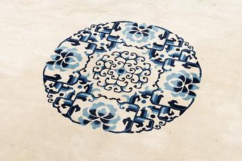 A semi-antique/old Chinese carpet, c 320 x 232 cm.