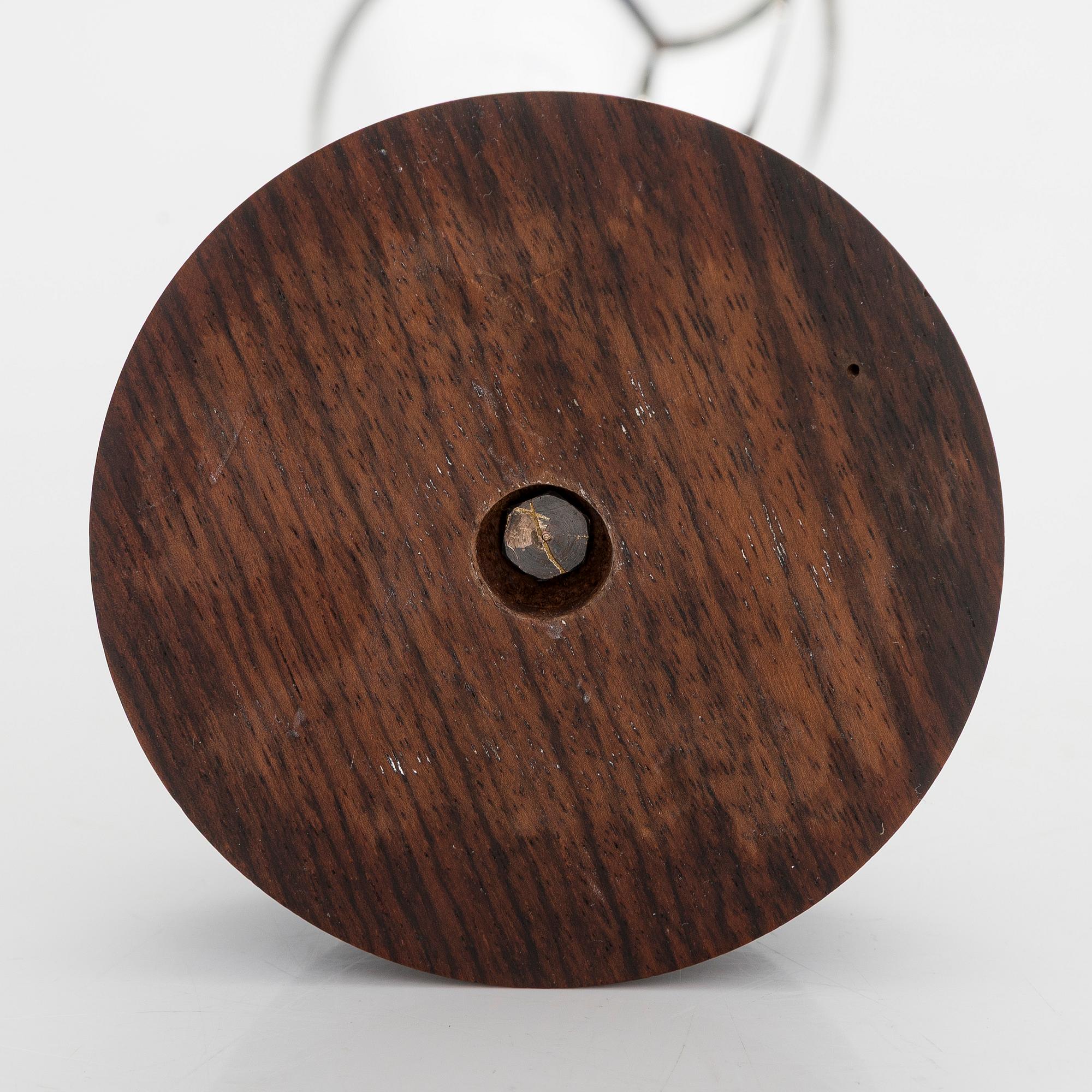 Tapio Wirkkala, a silver TW 228 'Flame' vase on a rosewood base, Kultakeskus, Hämeenlinna 1965.