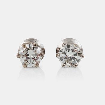 A pair of brilliant-cut diamond earrings. Total carat weight of diamonds circa 0.80 ct. Quality approximately I-J/VS.