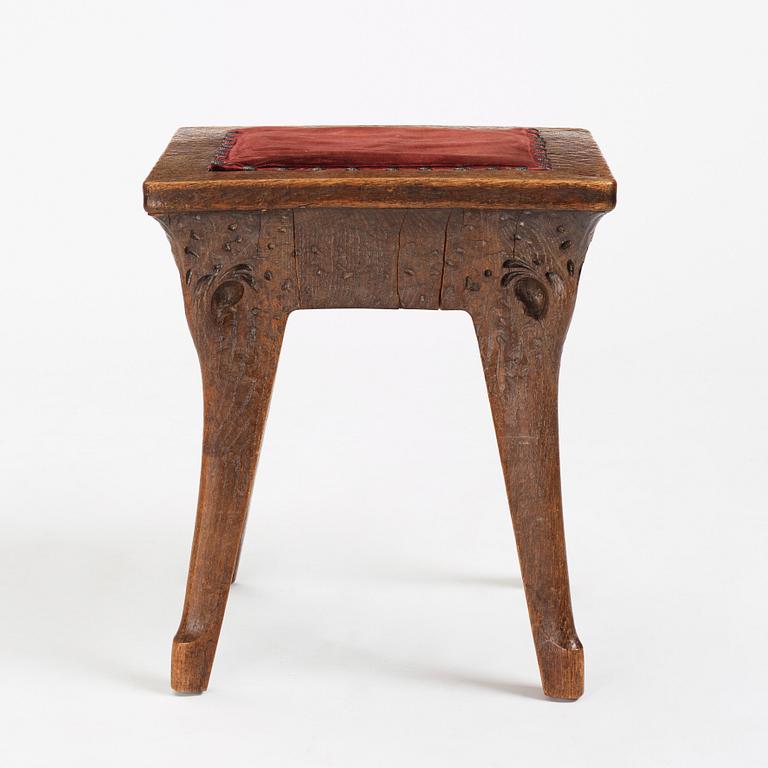 Swedish Art Nouveau, a carved oak stool, early 1900s.