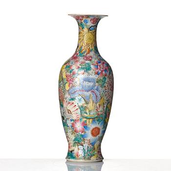 A famille rose 'mille fiori' vase, late Qing dynasty, with Qianlong mark.