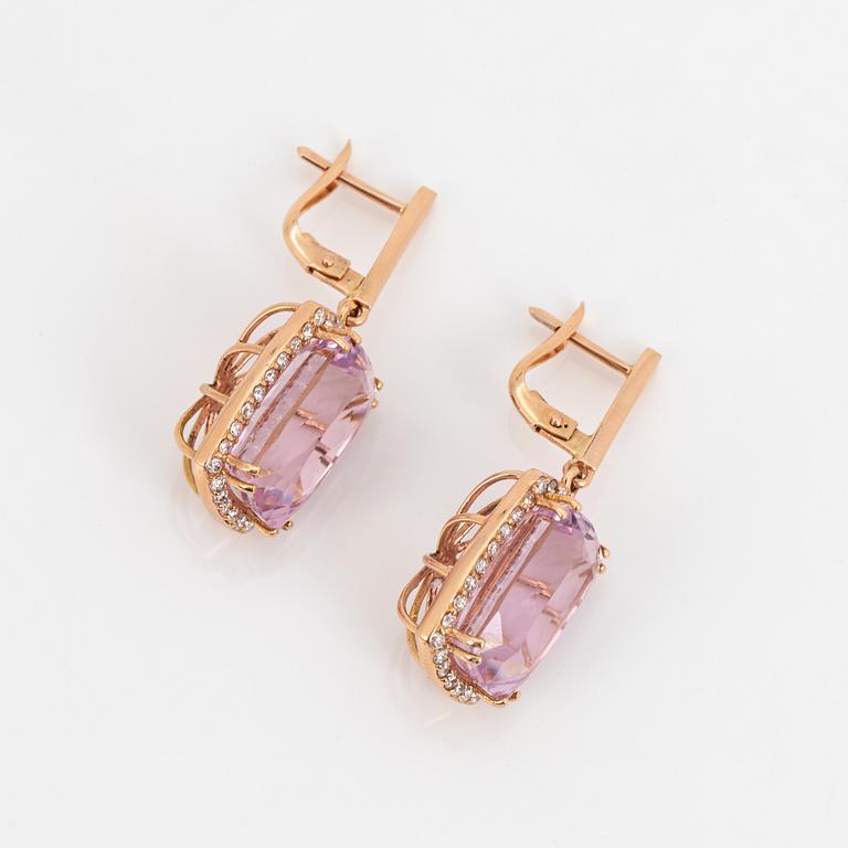 Kunzite and diamond earrings.