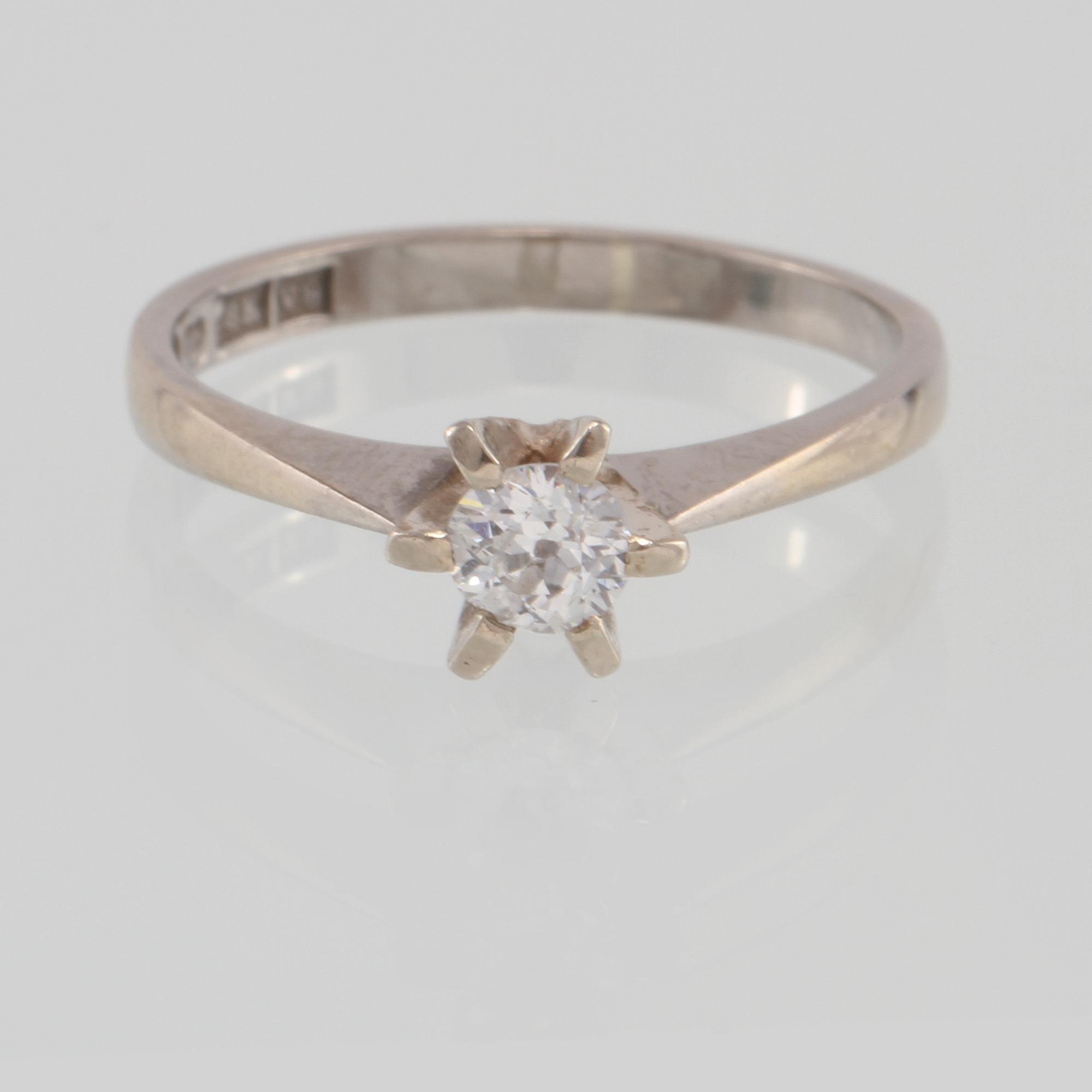 RING, 18K vitguld med briljantslipad diamant ca 0.27 ct, Bengt Andersson, Stockholm, 1971.Vikt 2,8 gram.