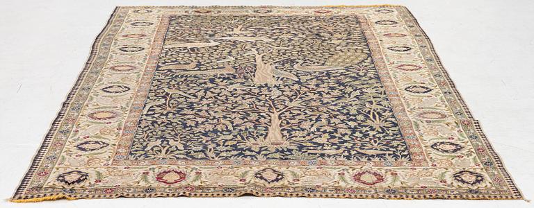 An antique silk Paderma/Kayseri rug, c. 217 x 153 cm.