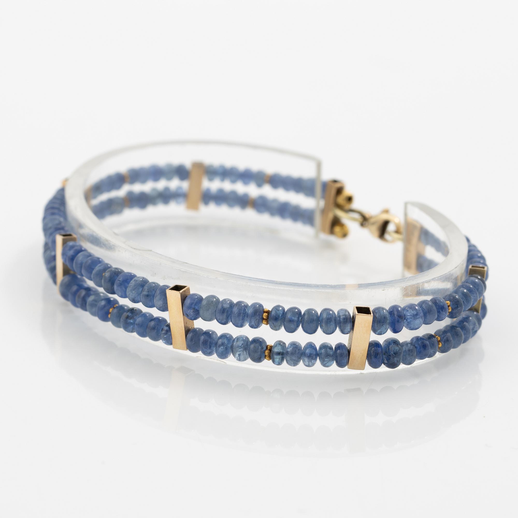 Bracelet, 14K gold with two rows of sapphires.