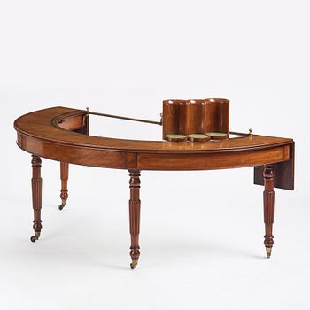 A Regency mahogny hunt table in the manner of Gillows, first part of 19th century.